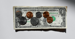 Coins on a dollar